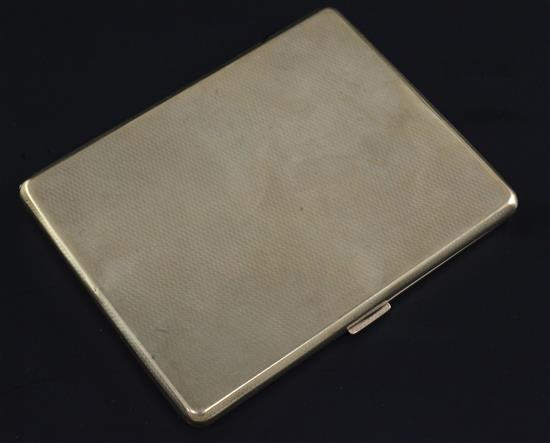 A late 1920s engine turned 9ct gold cigarette case, 4.25in.